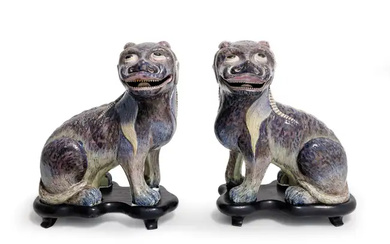 A pair of Chinese enamelled mythical beasts Qing dynasty, 19th century Of...