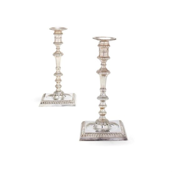 A pair of George II cast silver square candlesticks by John Cafe
