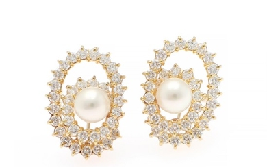 A pair of pearl and diamond ear pendants each set with a pearl and numerous brilliant-cut diamonds, total weight app. 3.50 ct., mounted in 18k gold. (2)