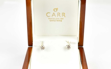 A pair of white gold earrings with claw set brilliant...