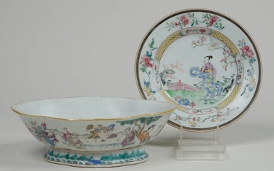 A polylobed bowl and a plate in polychrome...