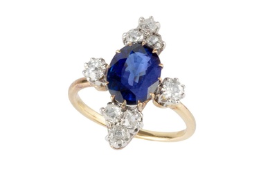A sapphire and diamond dress ring, the oval cut sapphire...