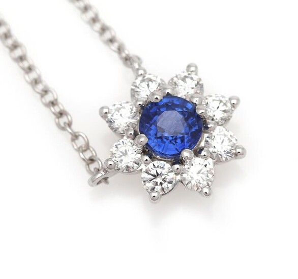 NOT SOLD. A sapphire and diamond necklace set with a sapphire encircled by diamonds, mounted in 18k white gold. L. app. 40-43.5 cm. – Bruun Rasmussen Auctioneers of Fine Art