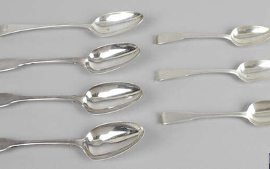 A selection of George III and George IV silver table spoons and dessert spoons.