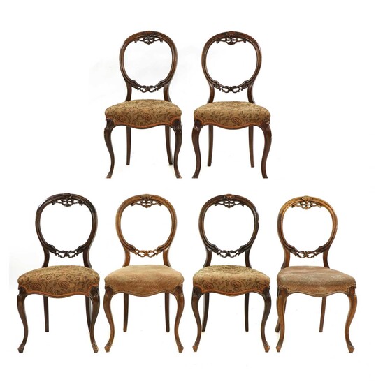 A set of six Victorian walnut balloon back single dining chairs