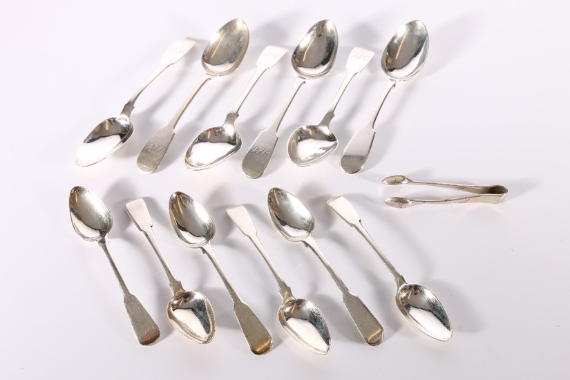 A set of three William IV silver dessert spoons of fiddle pa...