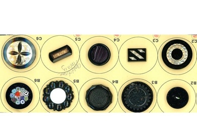 A small card of division one black glass buttons