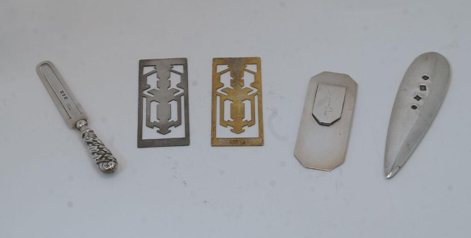 A small collection of silver and white metal bookmarks (5)