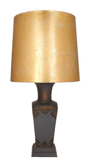 A table lamp, 20th century, of rectangular tapering form, with additional decorative plated motifs in brass, and gold fabric shade, 79cm high