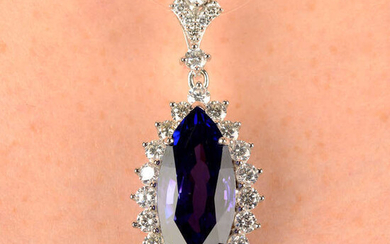 A tanzanite and brilliant-cut diamond cluster pendant.