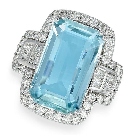 AN AQUAMARINE AND DIAMOND CLUSTER RING in 18ct white gold, set with an octagonal step cut aquamarine