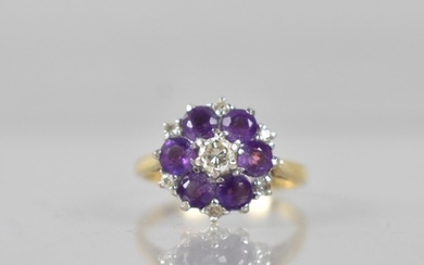 An 18ct Gold, Diamond and Untested Amethyst Ladies Cluster R...