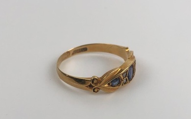 An 18ct gold and red stone ring, ring size O, and an 18ct go...