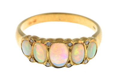 An 18ct gold opal and diamond ring.