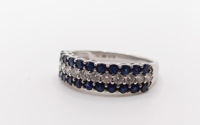 An 18ct white gold, diamond and sapphire ring, ring size L