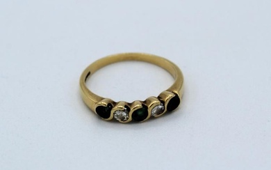 An 18ct yellow gold emerald and diamond half hoop ring,...
