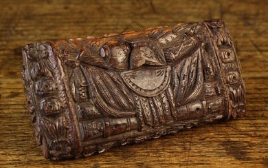 An 18th Century Carved Coquilla Nut Snuff Box of rectangular cushion form. The hinged lid carved wit