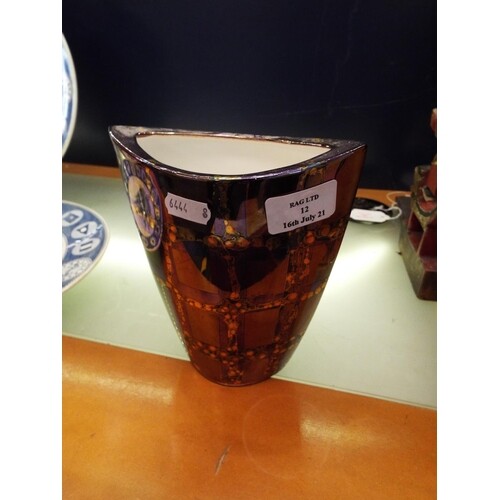 An Atkinson Jones ceramic lustre ware shaped vase signed to ...