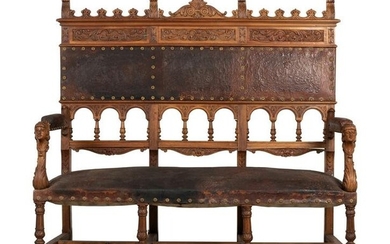 An Austrian Carved Walnut Bench with Tooled Leather