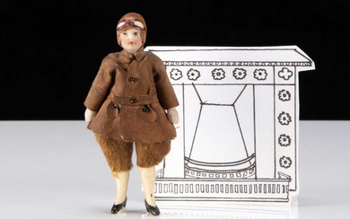 An all-bisque dolls’ house female pilot doll