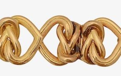 An attractive 18ct gold heart link bracelet by Garrard