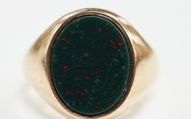 An early 20th century 15ct gold and oval cut bloodstone set ...