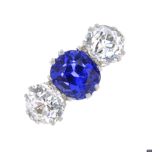 An early 20th century 18ct gold and platinum, Sri Lankan sapphire and diamond three-stone ring.