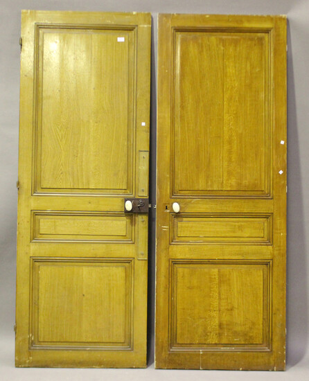 An early 20th century painted four-plank rustic door with applied iron strap hinges, 162cm x 81cm, a