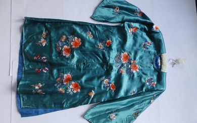 An early 20thC Chinese turquoise silk embroidered robe, worked...