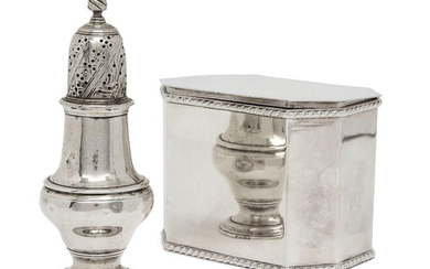An early George III silver caster, London, 1763, John Delmester, of circular baluster form with pierced domed cap and crest engraved to body, 13cm high, together with an unmarked white metal tea caddy, of octagonal form with gadrooned band to rim...