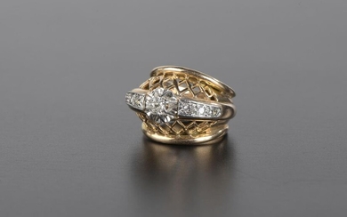 14k yellow gold and 850 thousandths platinum bandeau ring, scratched with an antique cut round diamond, approximately 0.2 ct, set on either side of a line of three small 8/8 cut diamonds in a mesh setting.