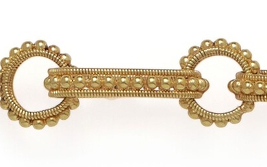 Bracelet souple en or jaune à décor de torsades...