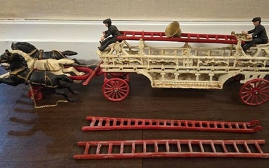 CAST IRON HORSE DRAWN FIRE LADDER TRUCK WITH DRIVERS HORSES LADDERS AND BELL 29 INCHES