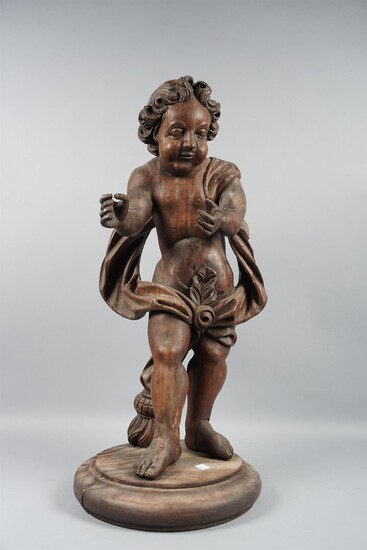 CONTINENTAL WOOD FIGURE OF A PUTTO WITH DRAPERY SWAG, PROBABLY 19TH CENTURY