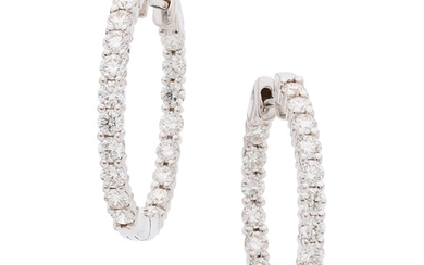 Diamond, White Gold Earrings The inside-out hoop earrings feature...