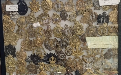 Display case of Commonwealth cap badges, to include: Royal...