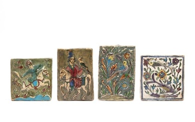 Four Persian Qajar Pottery Molded Tiles
