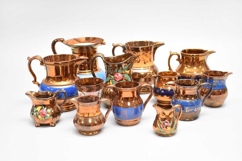 Group of copper lustre jugs
