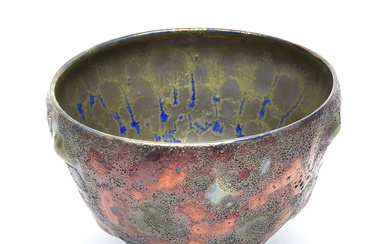 Handmade earthenware bowl decorated with lustreglaze in blue...