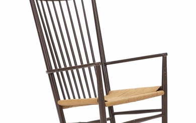 SOLD. Hans J. Wegner: “J 16”. A brown lacquered rocking chair, seat with woven paper cord. – Bruun Rasmussen Auctioneers of Fine Art