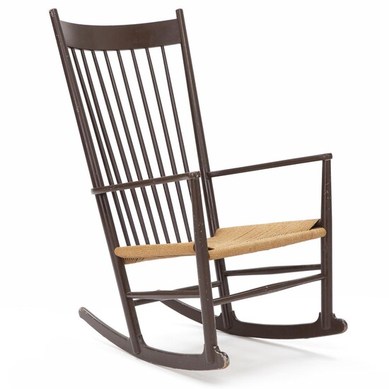 SOLD. Hans J. Wegner: “J 16”. A brown lacquered rocking chair, seat with woven paper cord. – Bruun Rasmussen Auctioneers of Fine Art