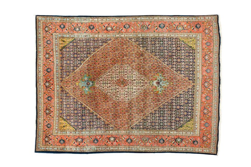 Important and rather fine Tabriz (North West of Persia) middle XX Dimensions. 322 x 244 cm Technical specifications. Wool velvet on cotton foundations Good condition Night blue field with motives said. Herati decorated with a central floral medallion...
