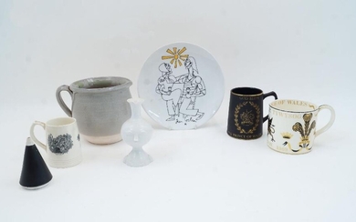 Jean Cocteau (1889-1963) for Limoges, a decorative plate with two figures under a sun, bearing signature, printed mark to underside, 24cm diameter, together with a group of collectible ceramics comprising two Wedgwood mugs commemorating the...