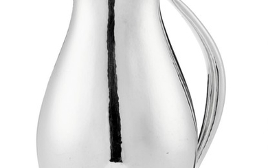 Johan Rohde: Large sterling silver pitcher with hammered surface. Design no. 432 C. Weight 954 g. H. 29.3 cm.
