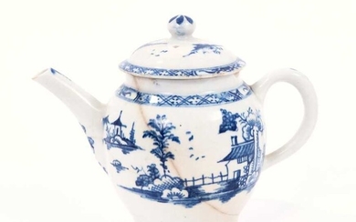 Lowestoft teapot and cover, of globular form with a straight spout and button finial, painted in blue with a Chinese landscape, 10.7cm high
