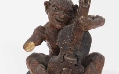 Martin Brothers salt glazed pottery sculpture of a grotesque figure playing a cello