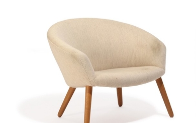 Nanna Ditzel: A round easy chair upholstered with light wool, oak legs. Model AP 26. Manufactured by AP-Stolen, Copenhagen.
