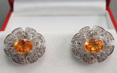 Pair of 18-Karat White-Gold, Orange Sapphire and Pave Diamond Pierced Earrings, each sapphire approx 7.45 x 5.90 mm, 5 gdwt, L: 5/8 in