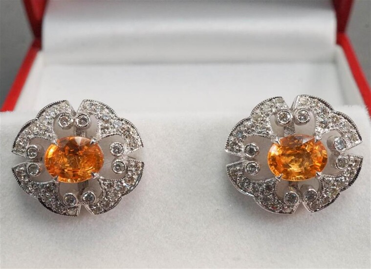 Pair of 18-Karat White-Gold, Orange Sapphire and Pave Diamond Pierced Earrings, each sapphire approx 7.45 x 5.90 mm, 5 gdwt, L: 5/8 in