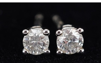 Pair of 9ct white gold diamond solitaire stud earrings with ...